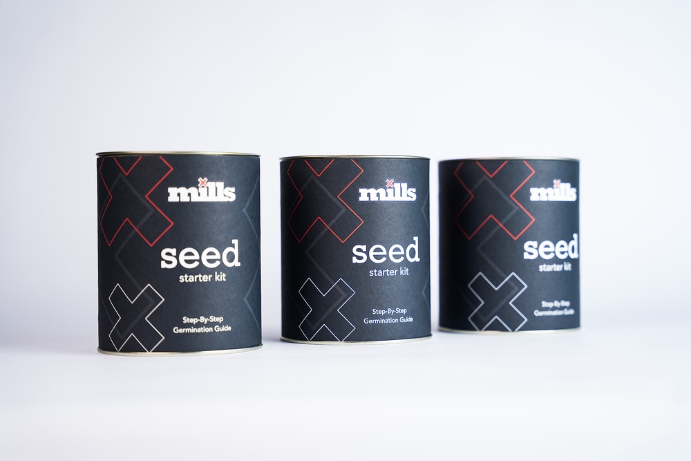 Three Mills Seed Starter Kit tins side by side on a light background